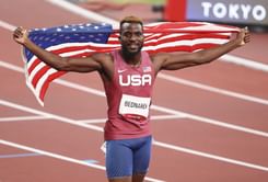 Kenny Bednarek flaunts Diamond League trophy after beating Olympic champion Letsile Tebogo for the 200m title in Brussels