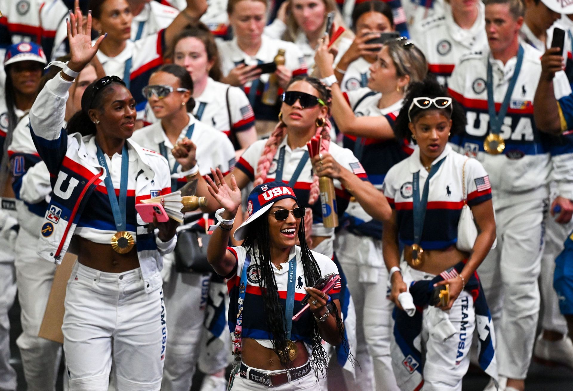 Tara Davis-Woodhall [Centre] greeting the crowd at the closing ceremony of the Paris Olympics 2024 [Image Source : Getty]