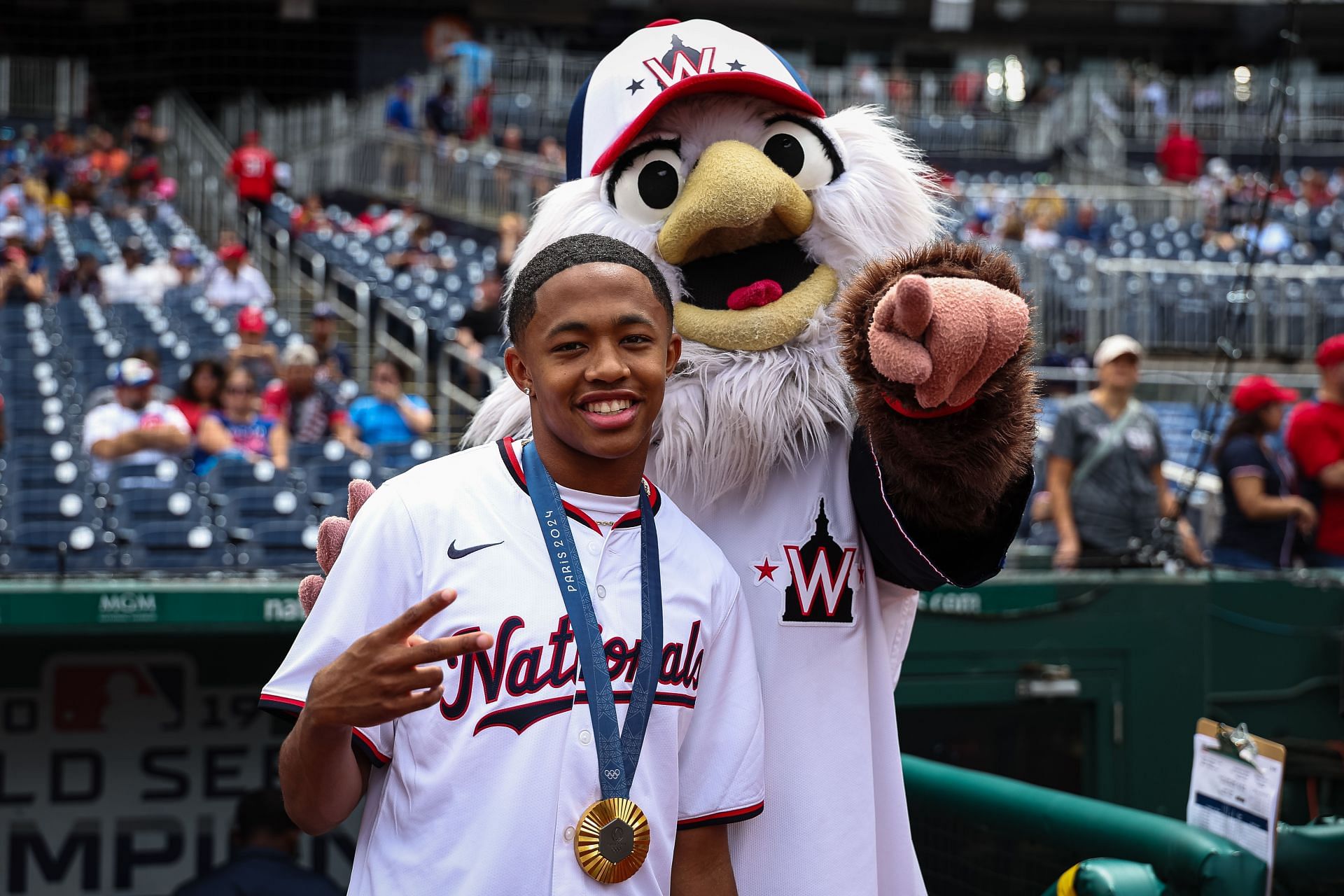 Quincy Wilson alongside the Washington Nationals mascot before the game against the Chicago Cubs (Photo via Getty Images)