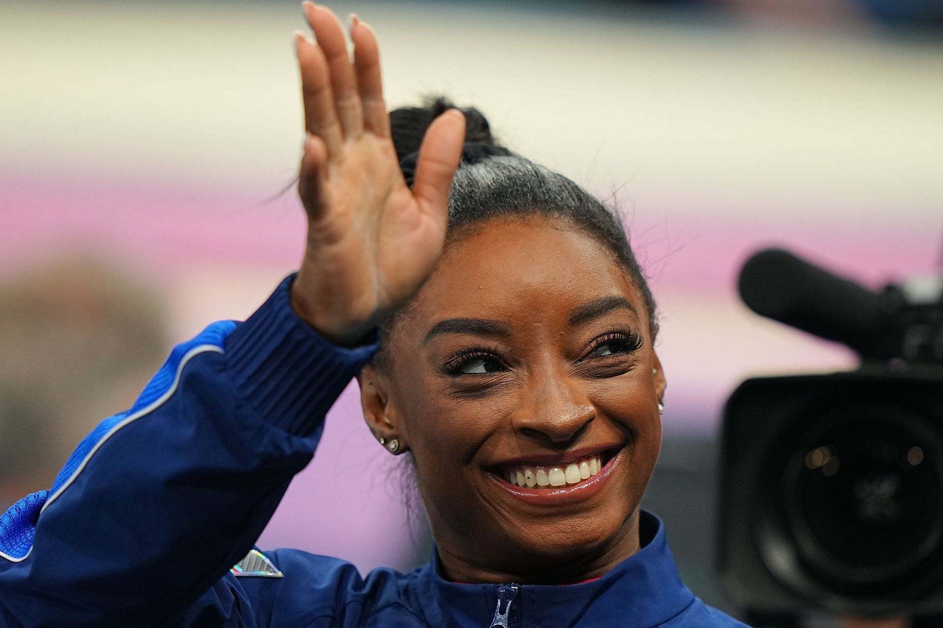 Simone Biles waves to the crowd at the Paris Olympics [Image for Representational Purposes] [Image Source : Getty]