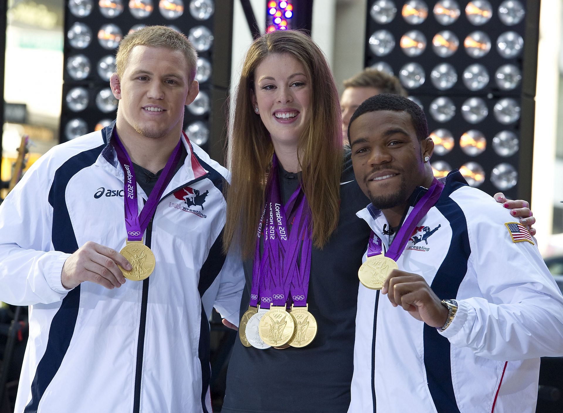 Olympic champion Jordan Burroughs [Extreme Right] with wrestler Jake Varner and swimmer Allison Schmitt [Image Source : Getty]