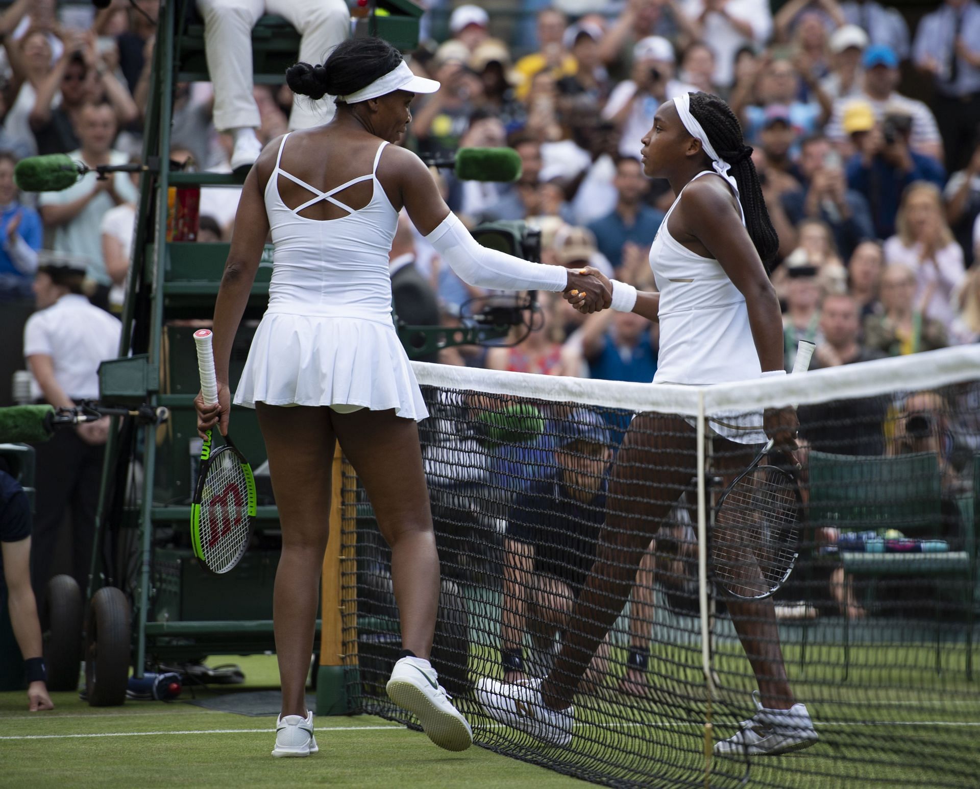 Venus Williams and Coco Gauff shake hands after their Wimbledon matchup (Source: Getty)