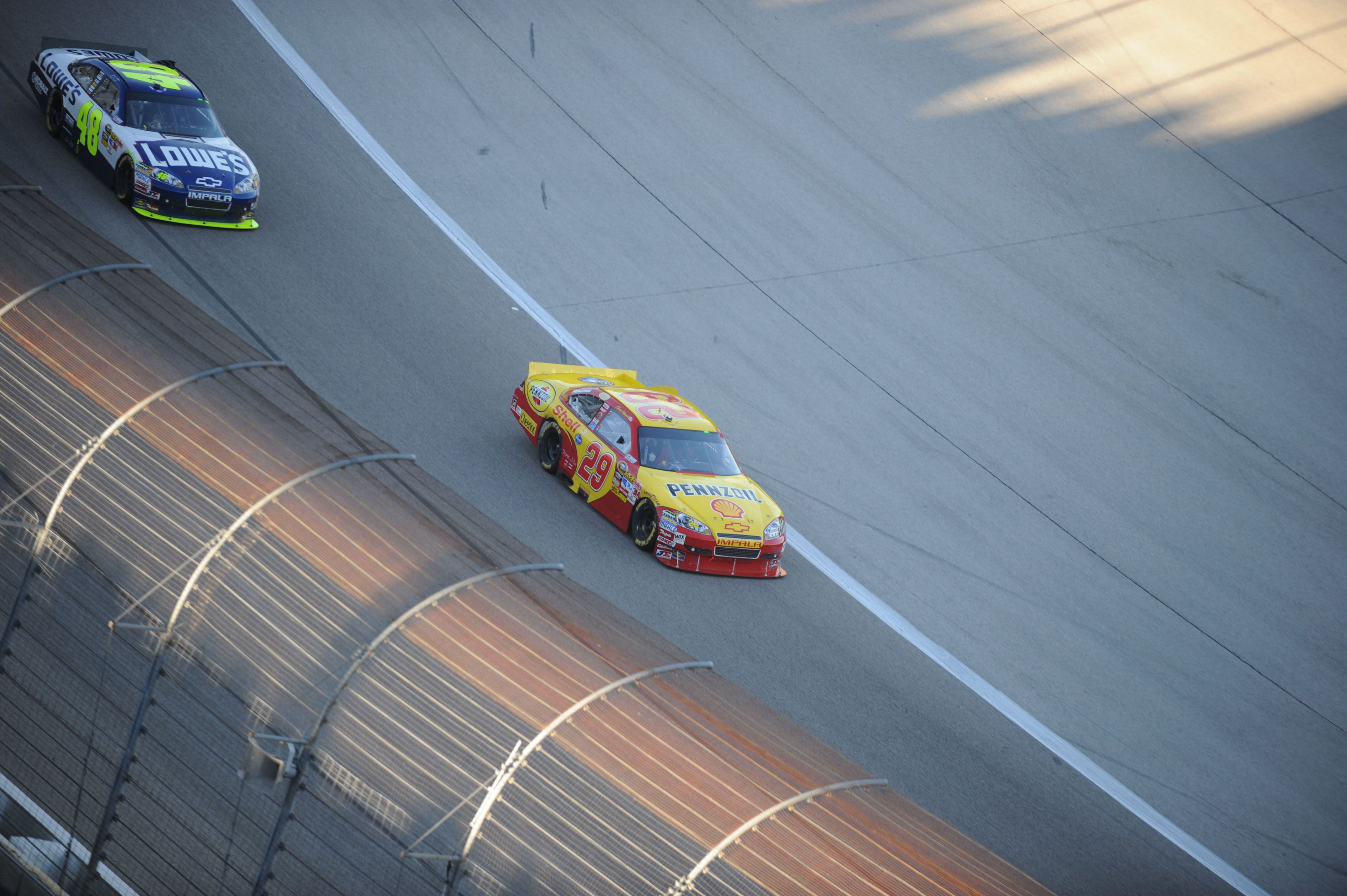 Sprint Cup Series drivers Jimmie Johnson (48) and Denny Hamlin (29) during the AAA Texas 500 at Texas Motor Speedway (Source: Imagn)