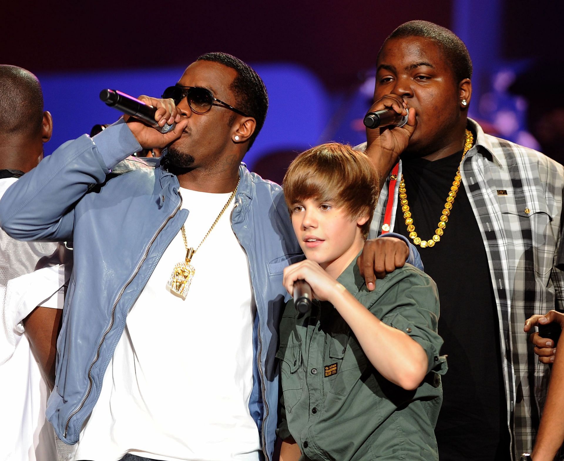 Sean Combs, Justin Bieber, and Sean Kingston perform at the BET SOS Saving Ourselves � Help for Haiti� benefit concert and telethon on February 5, 2010, in Miami, Florida. (Photo by Larry Marano/Getty Images)