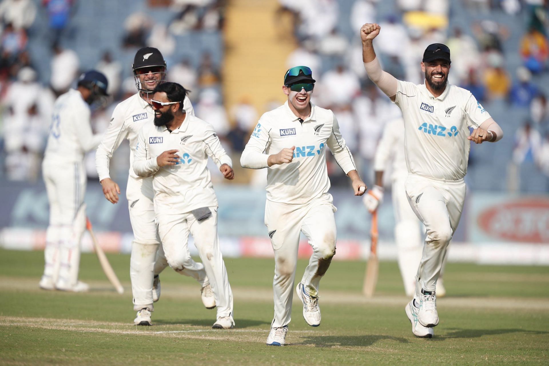 New Zealand celebrating their victory over India in Pune. [@Blackcaps on X]