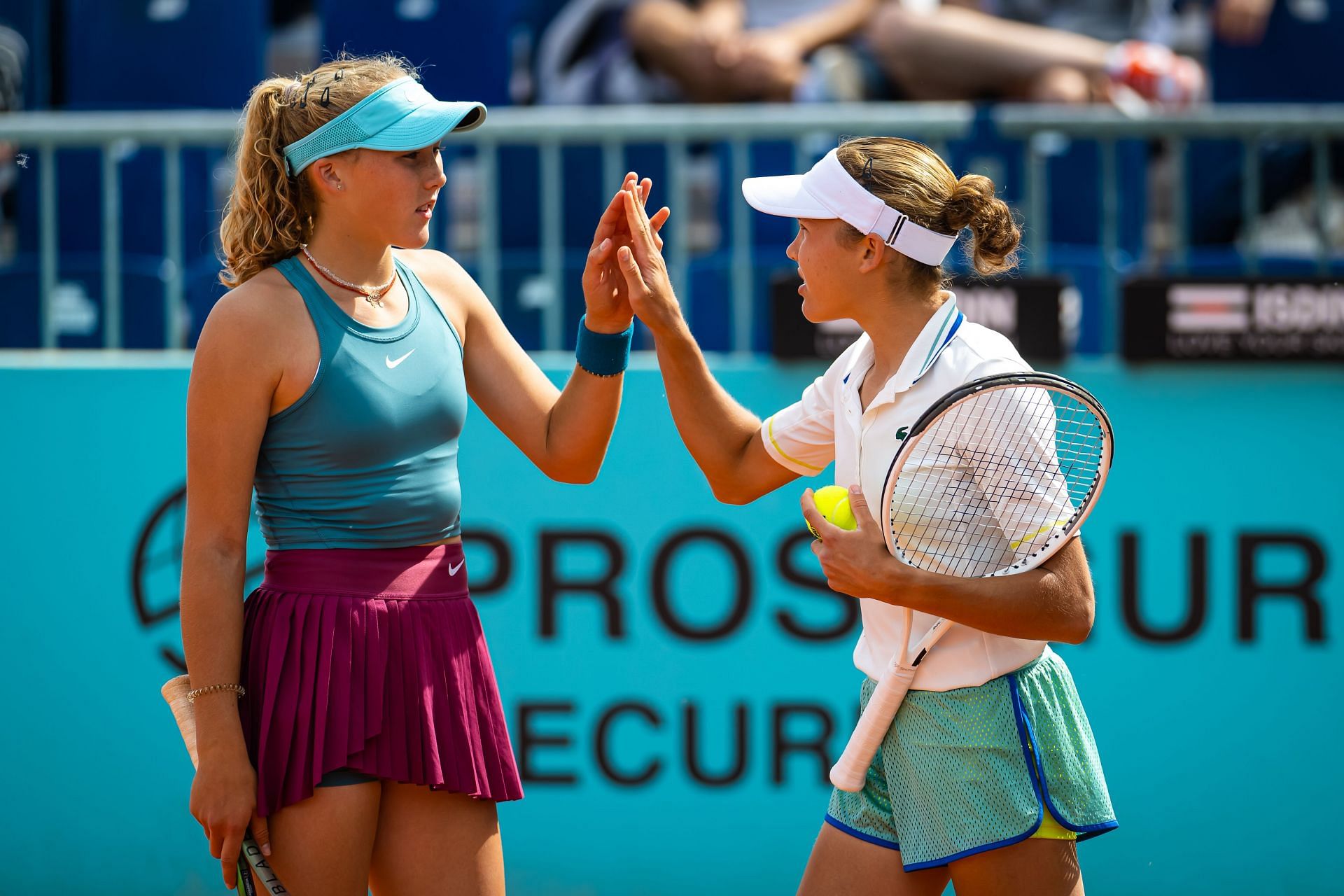 Mirra Andreeva (L) pictured with Erika Andreeva (R) at the 2023 Madrid Open - Image Source: Getty