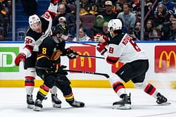 WATCH: Canucks' Conor Garland eats Erik Haula's unrelenting punches in spirited tilt