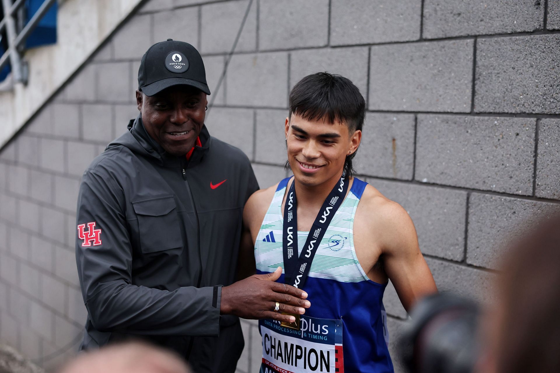 Louie Hinchliffe with former coach Carl Lewis (Photo by J Kruger - British Athletics/British Athletics via Getty Images)