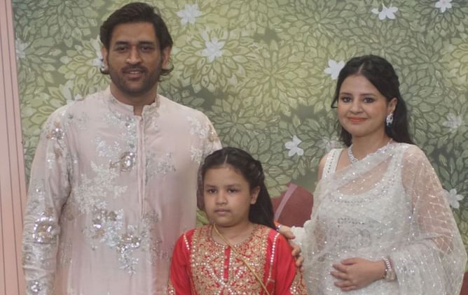 [Watch] MS Dhoni cheerfully interacts with co-passengers after boarding a flight