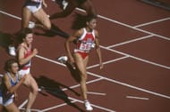Florence Griffith Joyner competes in the women's 200-meter semi-final at the 1988 Olympics. (Photo via Getty Images)