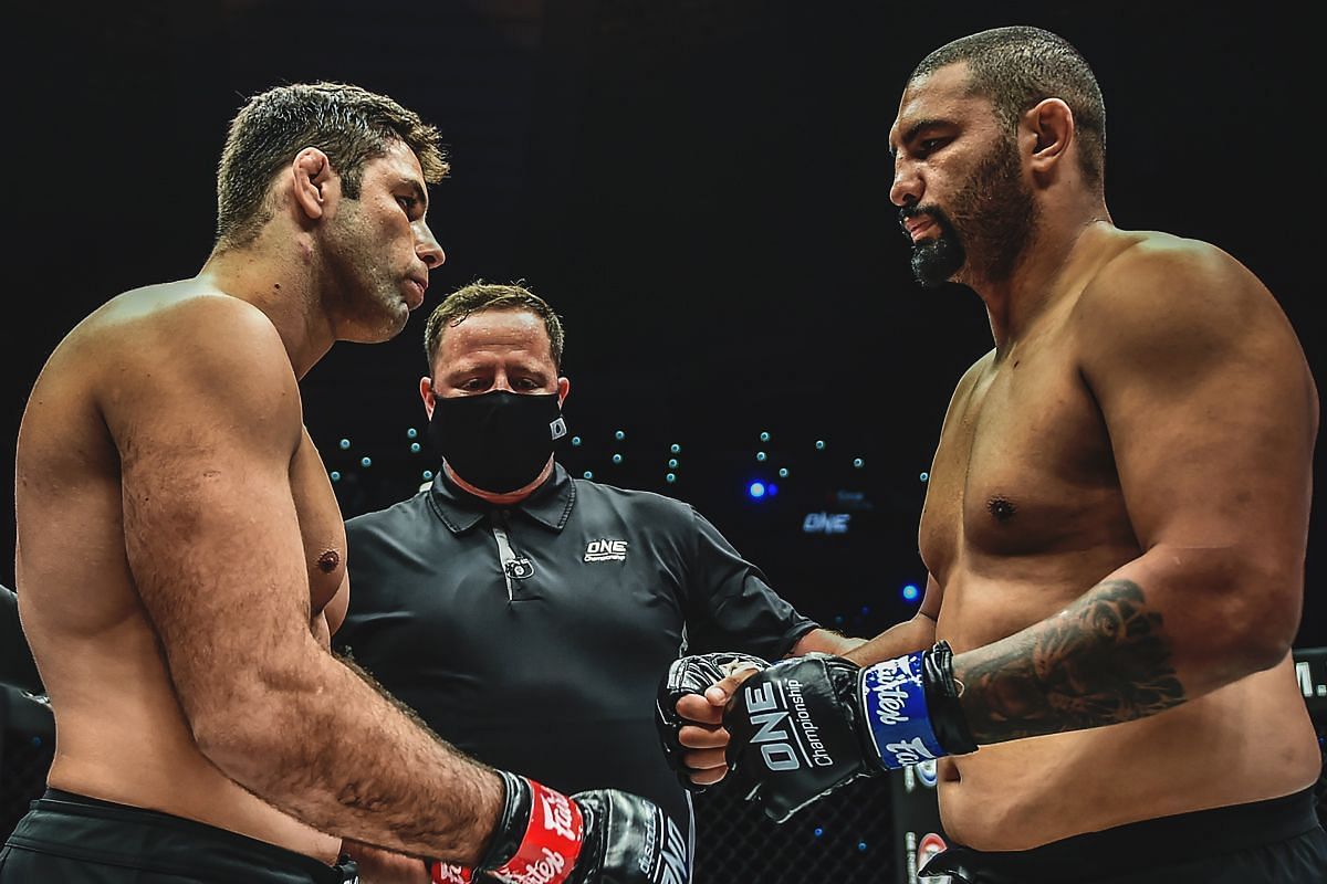 Marcus Almeida and Anderson Silva touch gloves | Image credit: ONE Championship