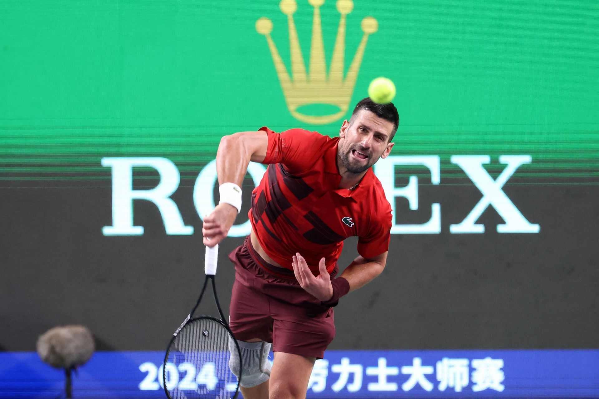 Novak Djokovic serves at Shanghai Masters 2024