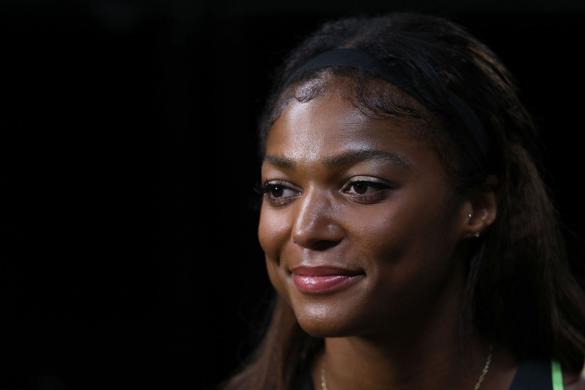 Gabby Thomas smiling for the camera at the 2024 Athlos NYC - (Source: Getty)