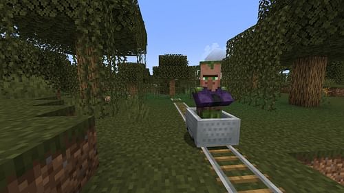 A rail system can be used to transfer villagers (Image via Mojang Studios)