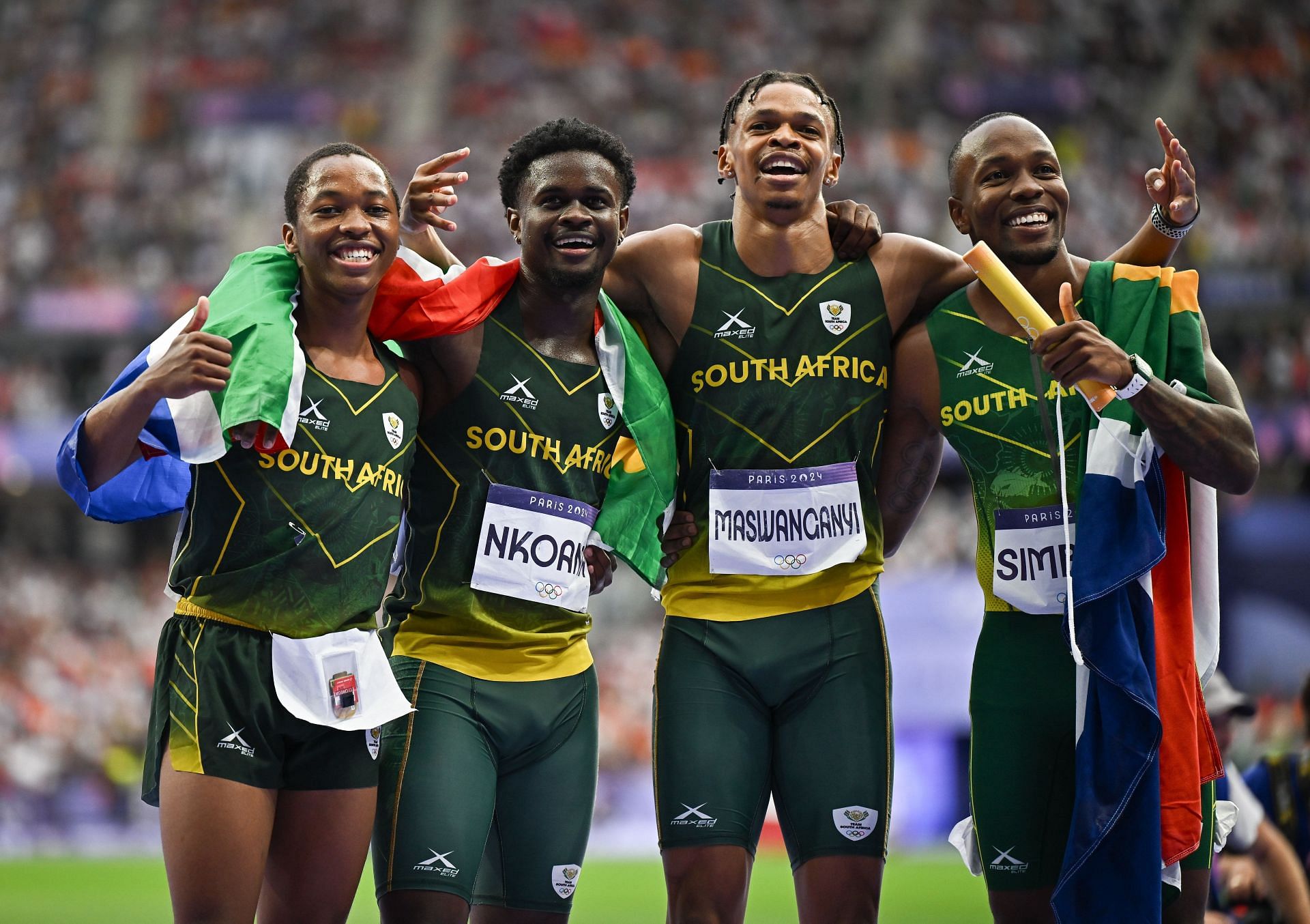 Akani Simbine [Extreme Right] with his teammates after winning the silver medal in men&#039;s 4x100m relay finals at the Paris Olympics [Image Source: Getty]