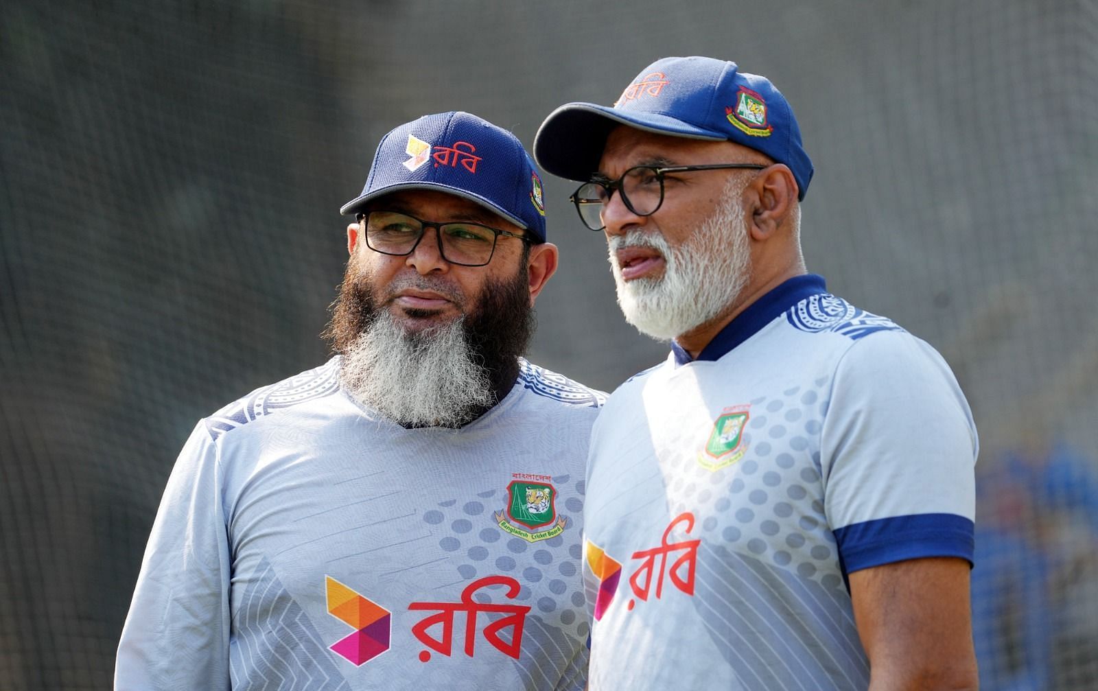 Mushtaq Ahmed and Chandika Hathurusingha. (Credits: BCB Twitter)