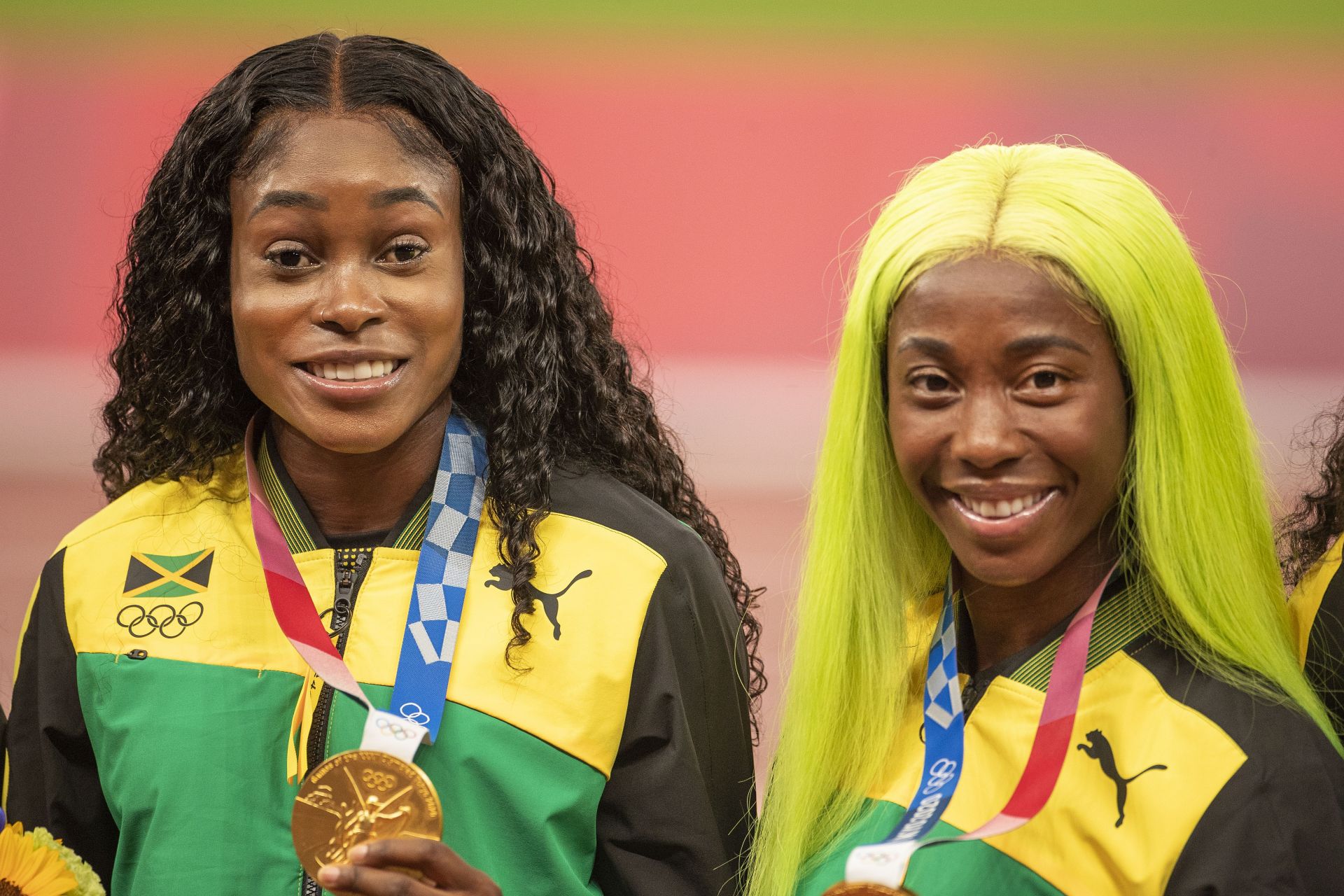 : Elaine Thompson-Herah and Shelly-Ann Fraser-Pryce at Tokyo Olympics. (Photo via Getty Images)