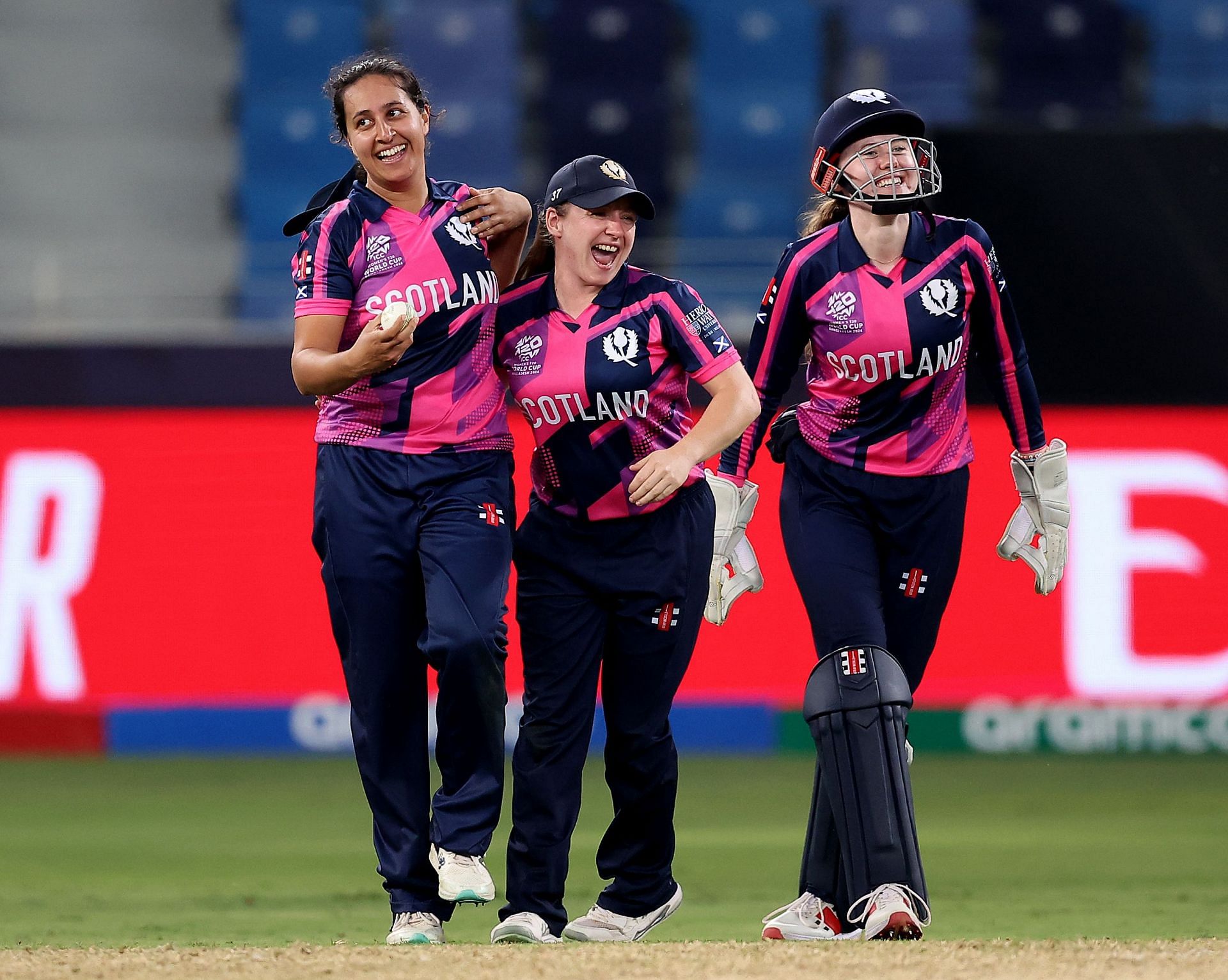 Priyanaz Chatterji (left) celebrates picking up the wicket of West Indies' captain Hayley Matthews.