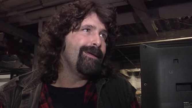 Mick Foley makes an announcement; asks for help