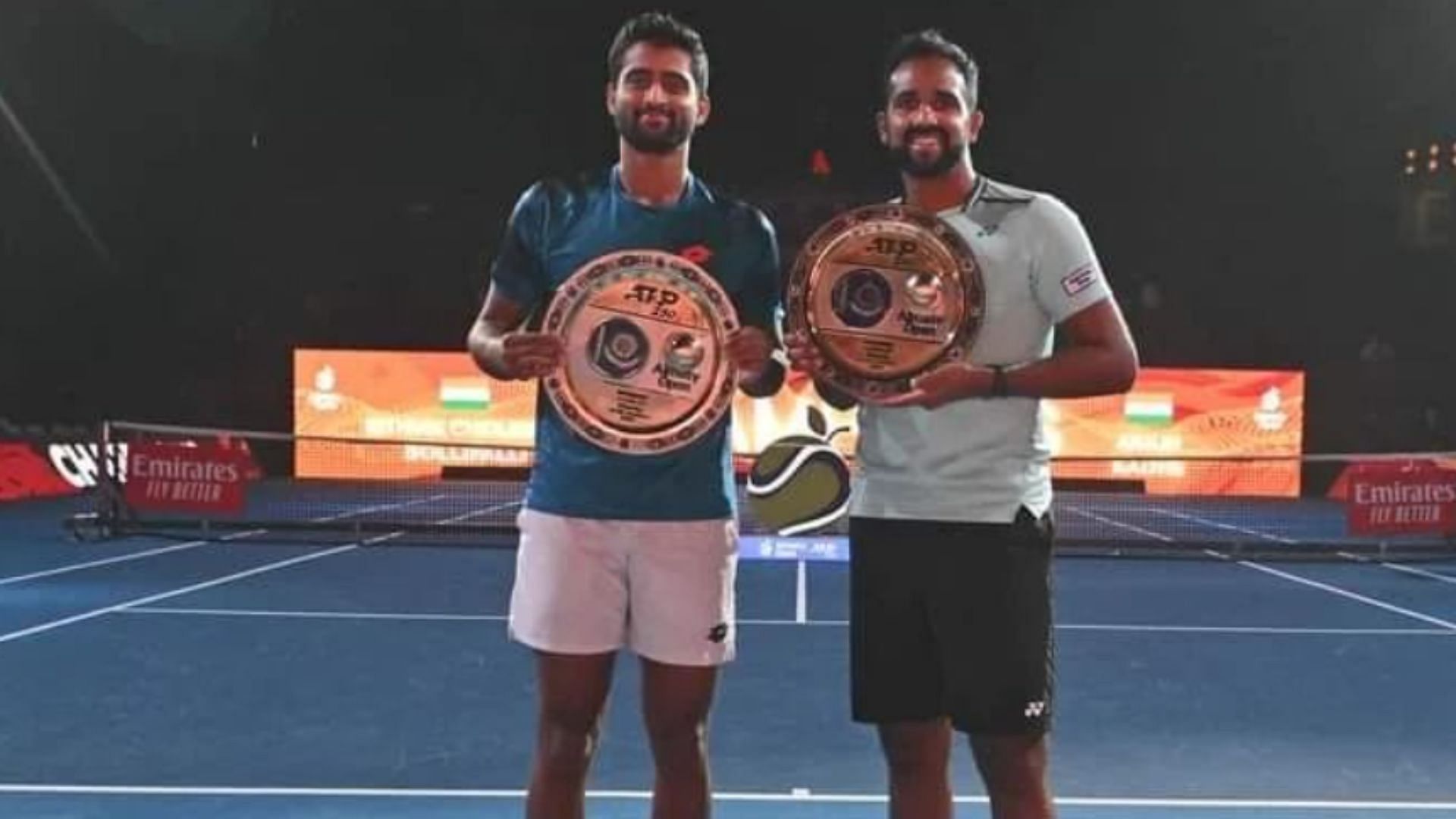 Rithvik Bollipalli and Arjun Kadhe with the title after their historic Almaty Open 2024 win (Image Credits: aitatennisofficial/IG)