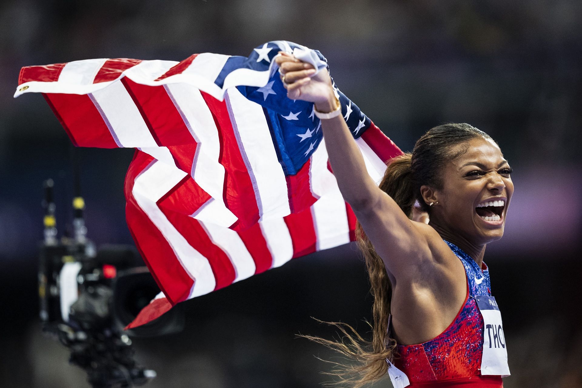 Gabby Thomas of Team United States celebrates victory in the Women&#039;s 200m final at the Olympic Games 2024 at Stade de France in Paris, France. (Photo by Getty Images)