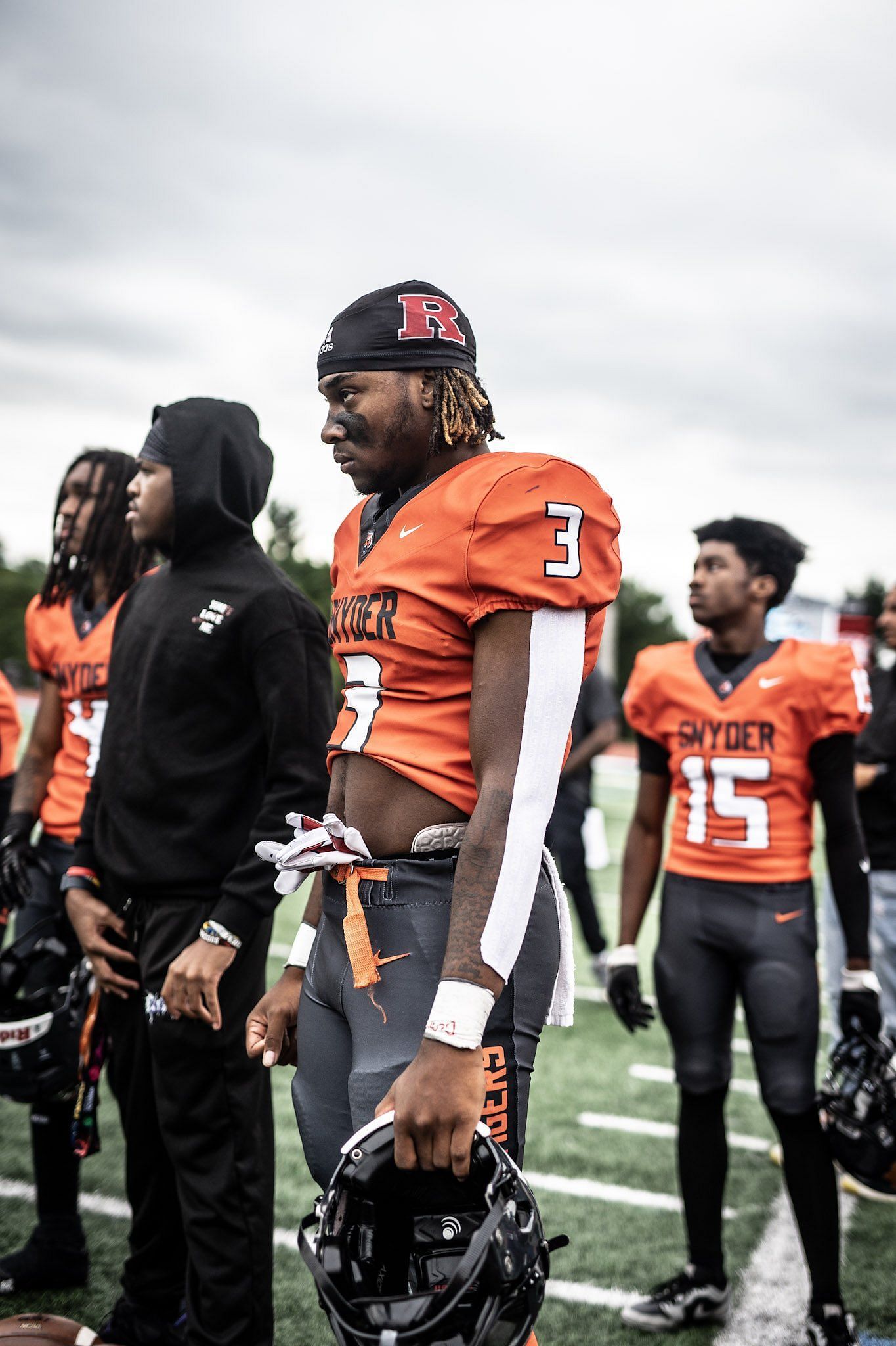 DJ McClary watches from the sidelines as his Snyder High (Jersey City) Tigers take on Darren Ikinnagbon and the Hillside High Comets during the first game of the season. Snyder lost the season opener 42-20. (Photo Credit: DJ McClary via x.com)