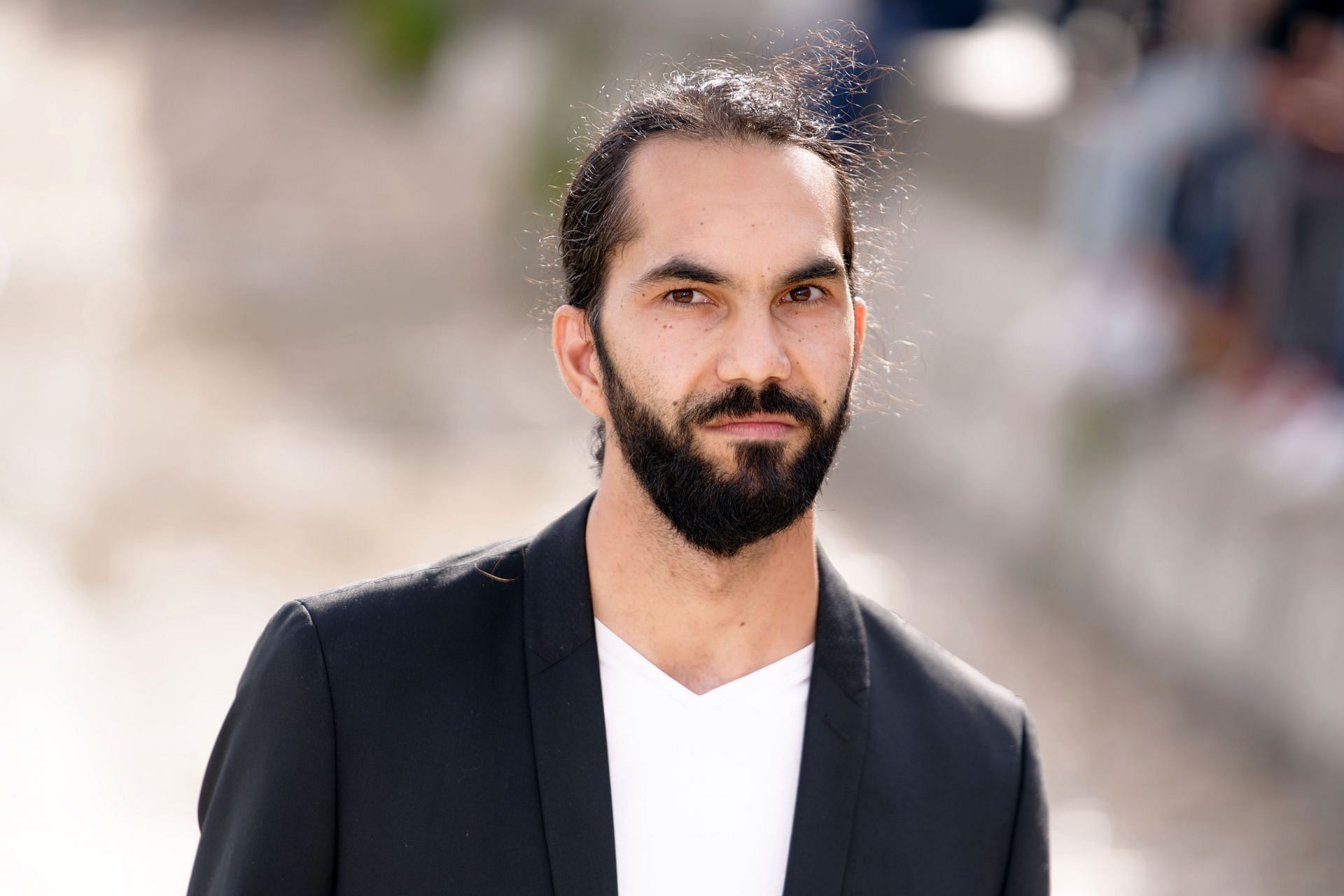 Ali Boulabiar as Kamil (Image via Sylvain Lefevre/Getty Images)