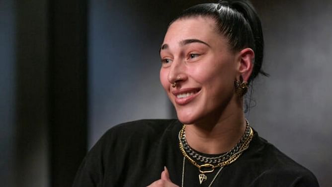 Rhea Ripley reacts after champion walks away from the Judgment Day on WWE RAW