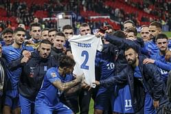 Greece players pay tribute to George Baldock as Vangelis Pavlidis gives them the lead against England