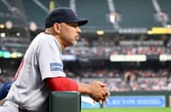 Alex Cora looks on from the dugout - Source: Getty