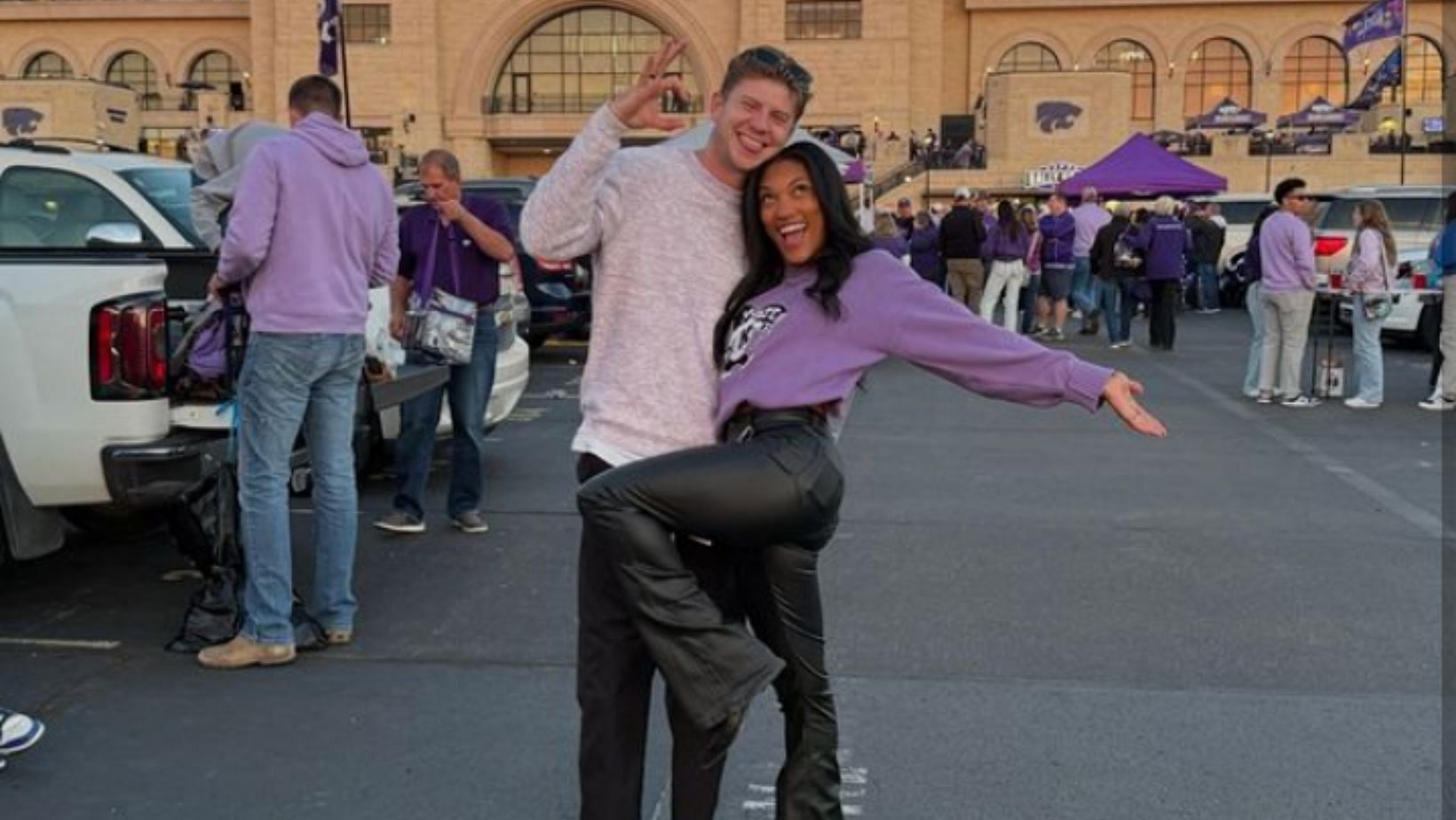 Tara Davis-Woodhall attends a K-State University game with her husband Hunter (Image Source: @_taarra_ on Instagram 