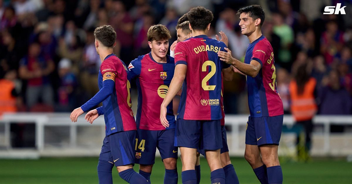 Barcelona players in action against Sevilla