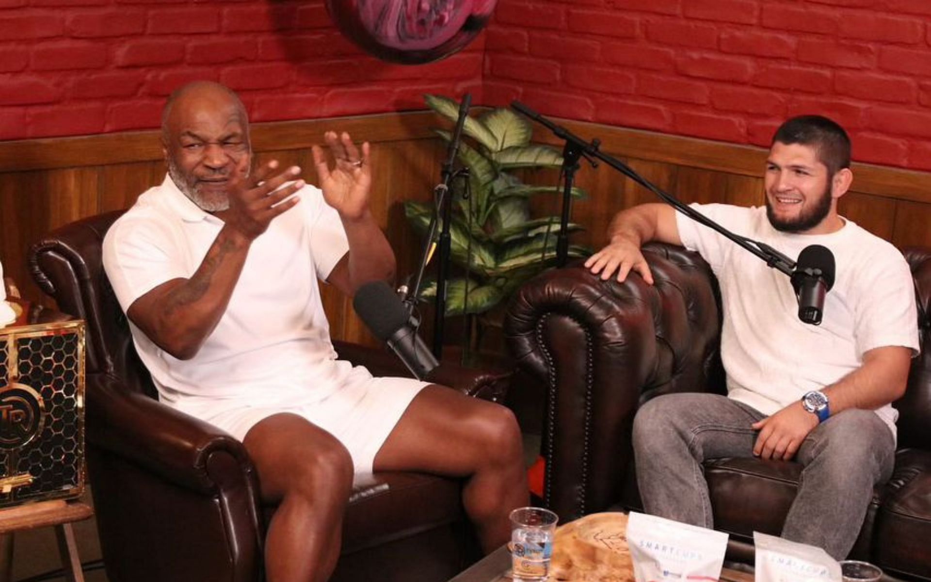 Mike Tyson (left) and Khabib Nurmagomedov (right) laughs jubilantly during the podcast. [Image courtesy: @khabib_nurmagomedov on Instagram]