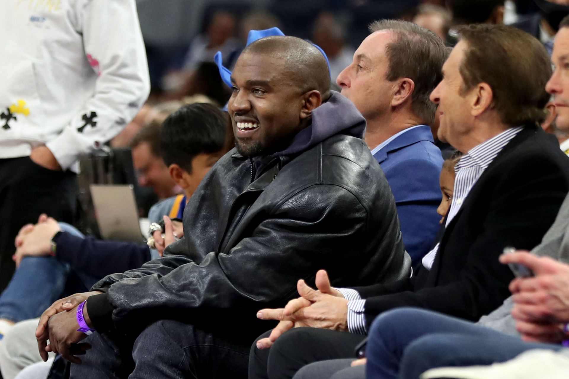 Kanye West and son watch game with Golden State Warriors co-owners - Source: Getty