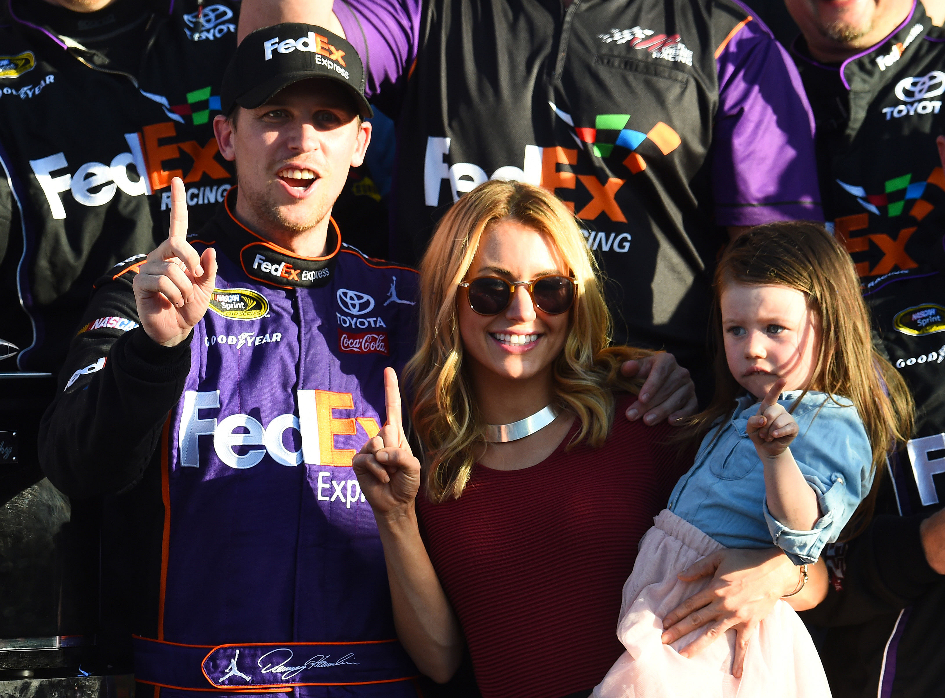 Denny Hamlin (11) reacts with Jordan Fish in victory lane after winning the Daytona 500 at Daytona International Speedway. Credit: Imagn Images