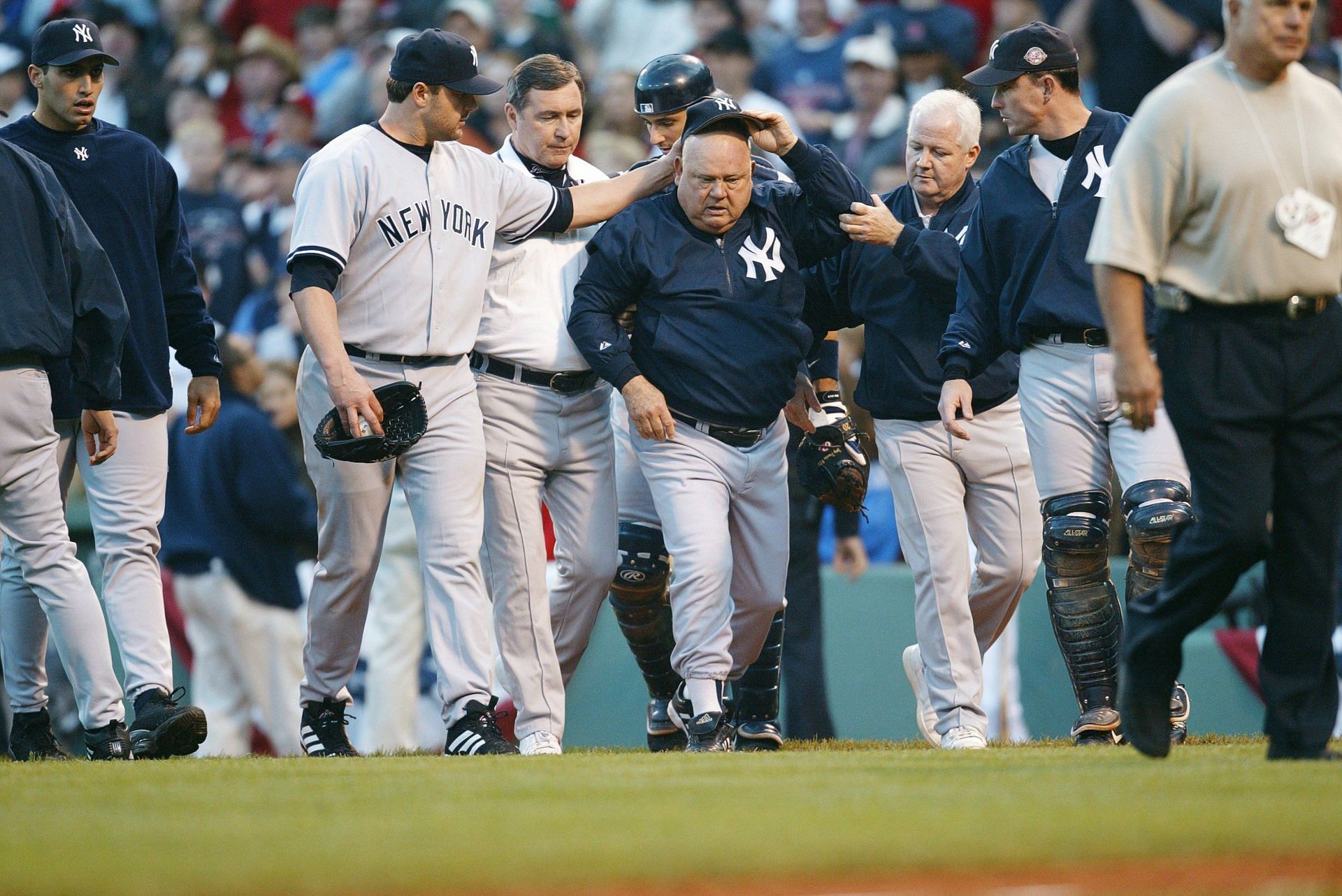 New York Yankees Coach Don Zimmer walks back to the dugout after being involved in a fight with Pedro Martinez - Source: Getty