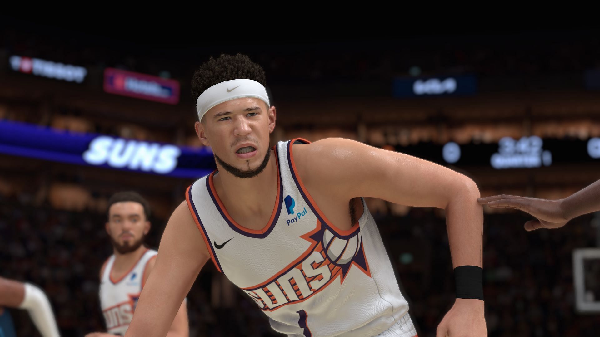 Devin Booker playing for the Phoenix Suns in NBA 2K25 (Image via Visual Concepts)