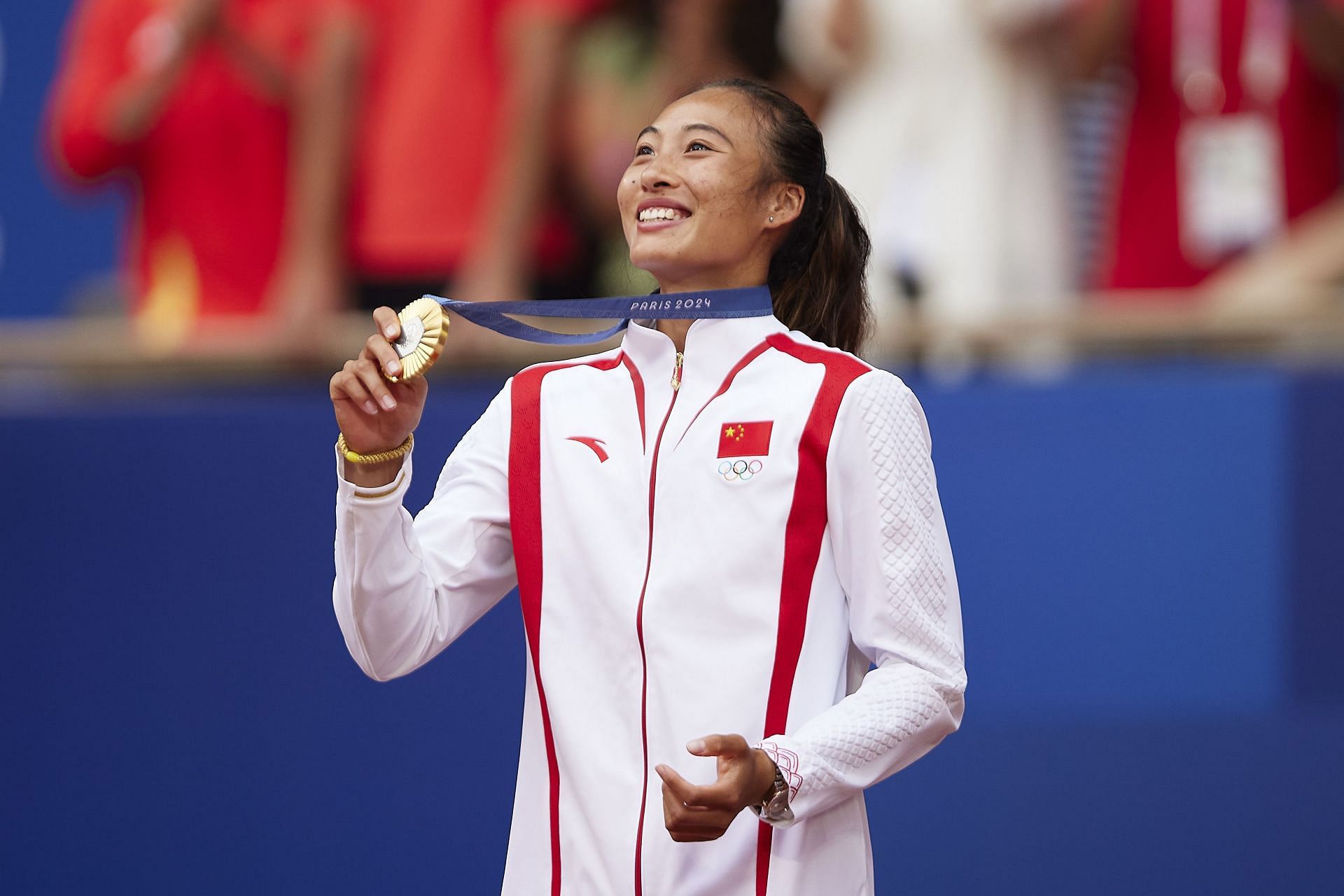 Zheng Qinwen with her Paris Olympics gold medal (Image: Getty)