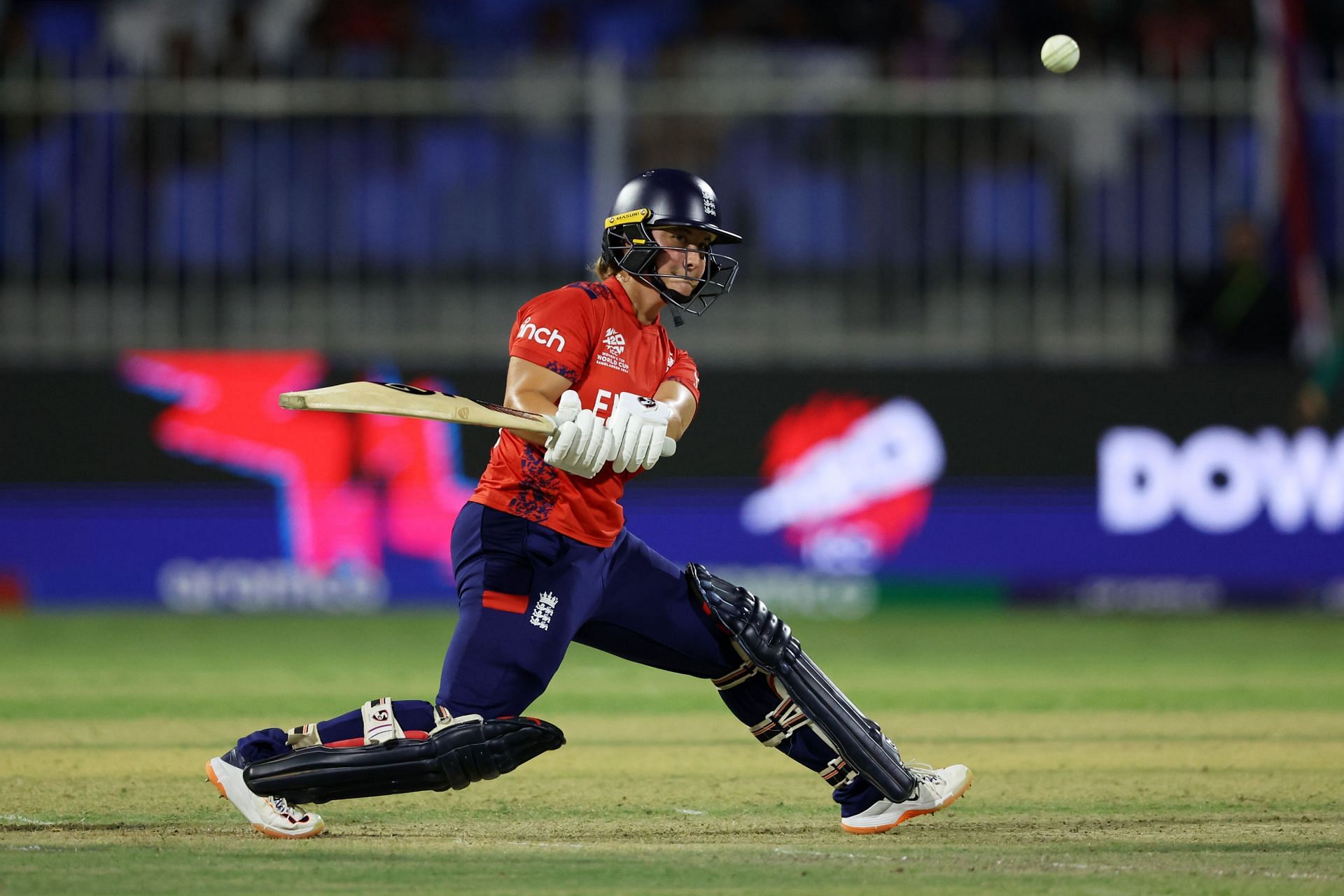 Alice Capsey playing a reverse sweep against Bangladesh.