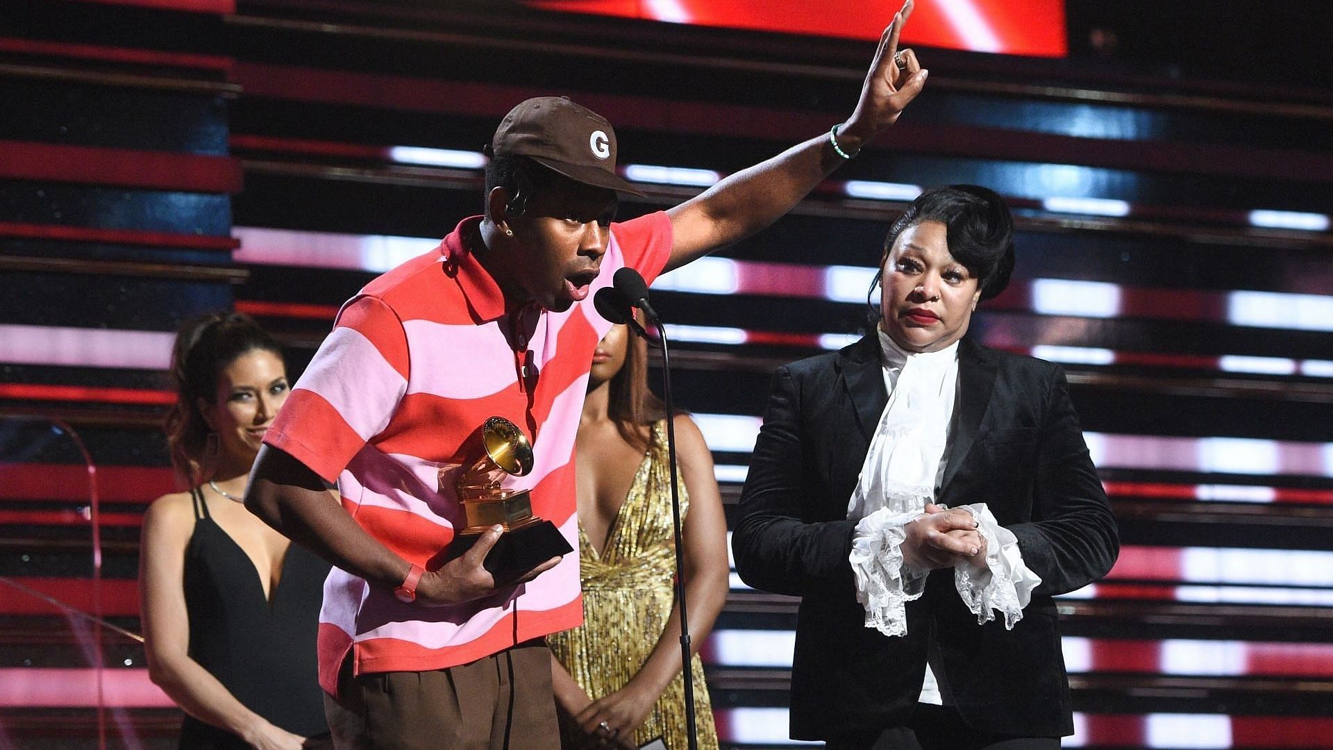 Tyler, the Creator (L) accepts award for Best Rap Album for &quot;Igor&quot; during the 62nd Annual GRAMMY Awards alongside his mother Bonita Smith (R) at STAPLES Center on January 26, 2020, in Los Angeles, California. (Photo by Kevin Mazur/Getty Images for The Recording Academy)