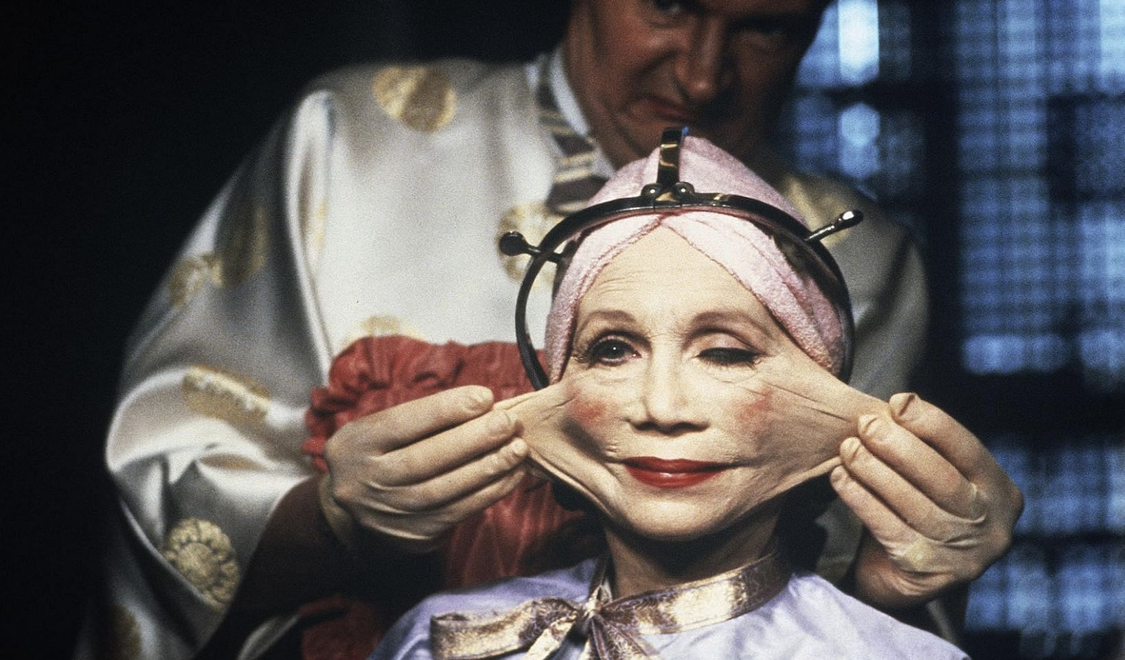 Jim Broadbent and Katherine Helmond in Brazil (Image via Embassy Pictures, 20th Century Fox)