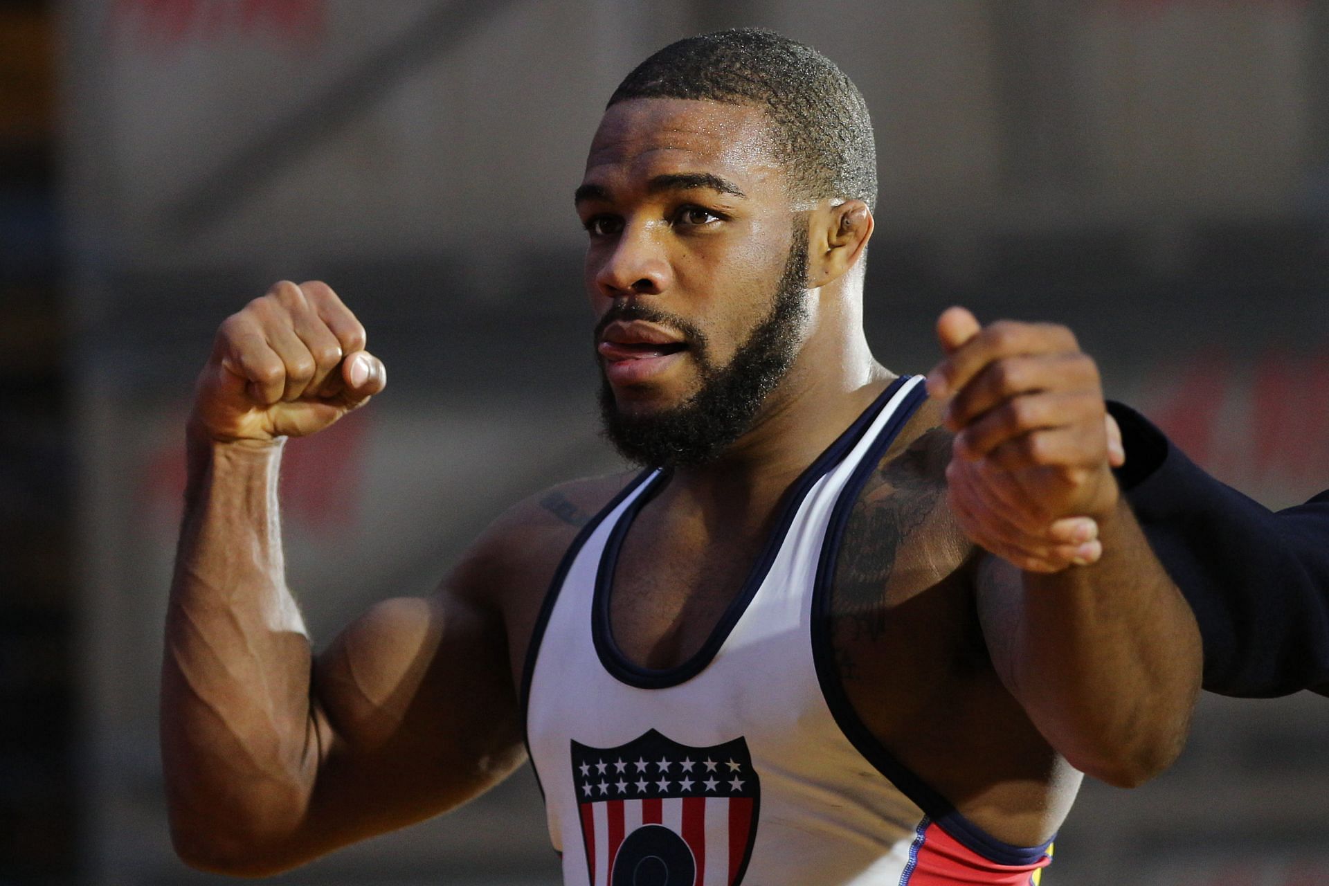 In Picture: Jordan Burroughs during an exhibition wrestling event (Image via Getty)