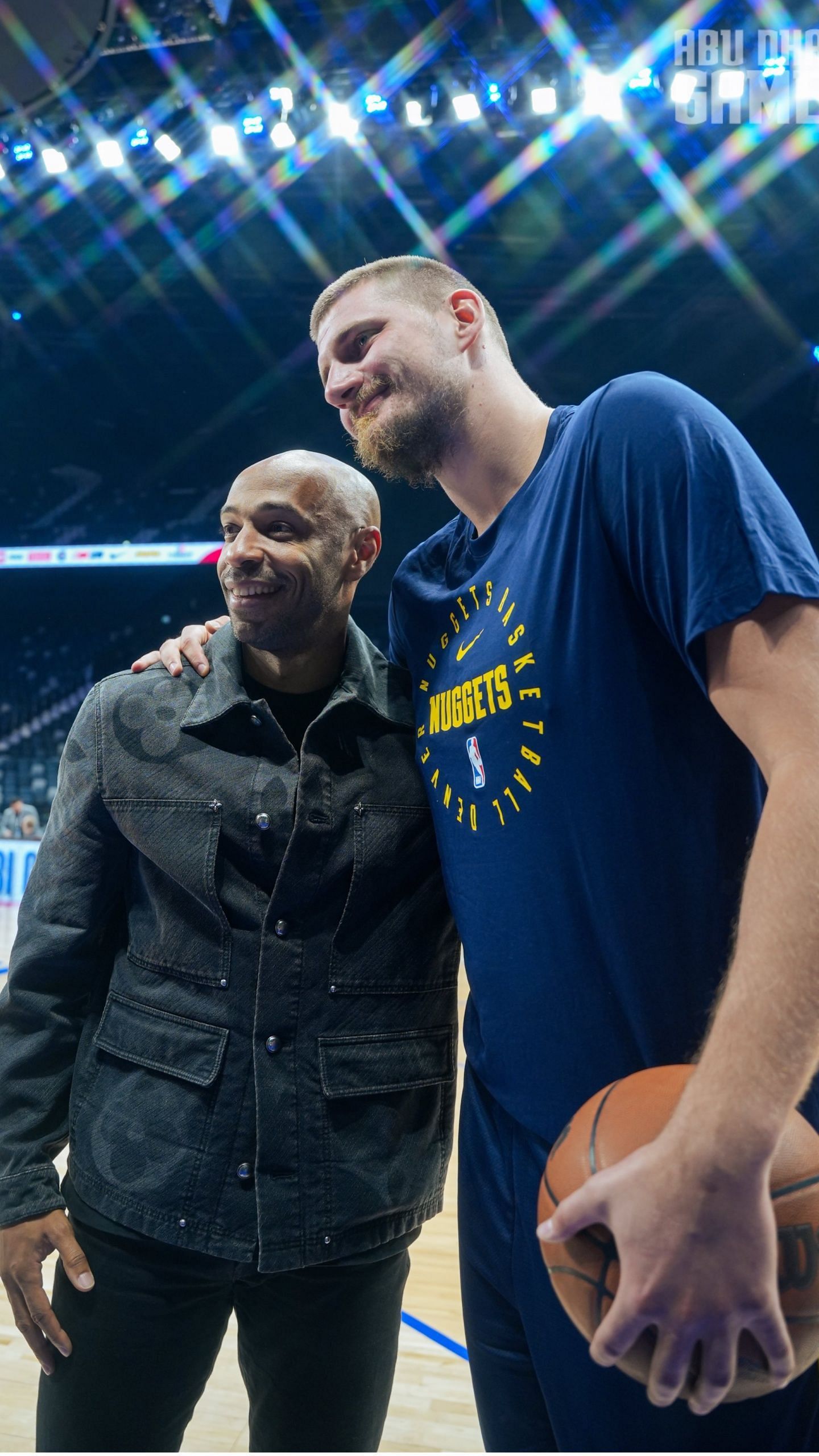 Nikola Jokic posing with Thierry Henry (Image Credits: X/Denver Nuggets)