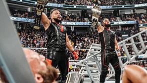 Tama Tonga sends a one-word message after The Bloodline retains the WWE Tag Team Championship in an insane Ladder Match