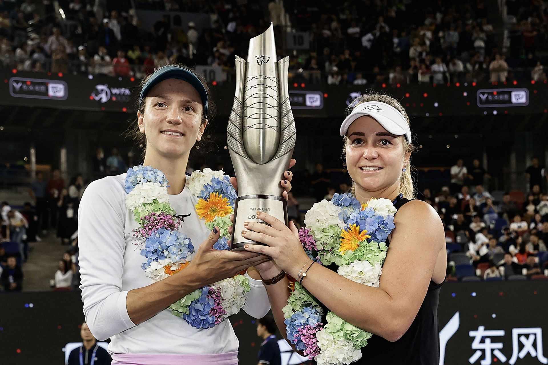 Anna Danilina (L) and Irina Khromacheva pictured at the 2024 Wuhan Open | Image Source: Getty