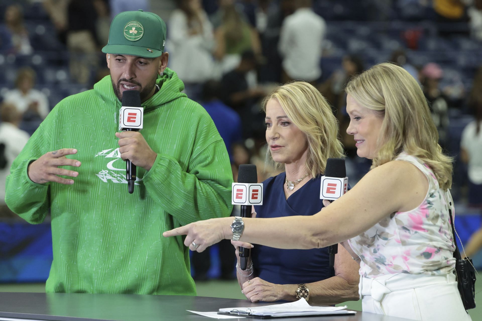 (L-R) Nick Kyrgios, Chris Evert, Chris McKendry comment for ESPN at the 2024 US Open (Image: Getty)