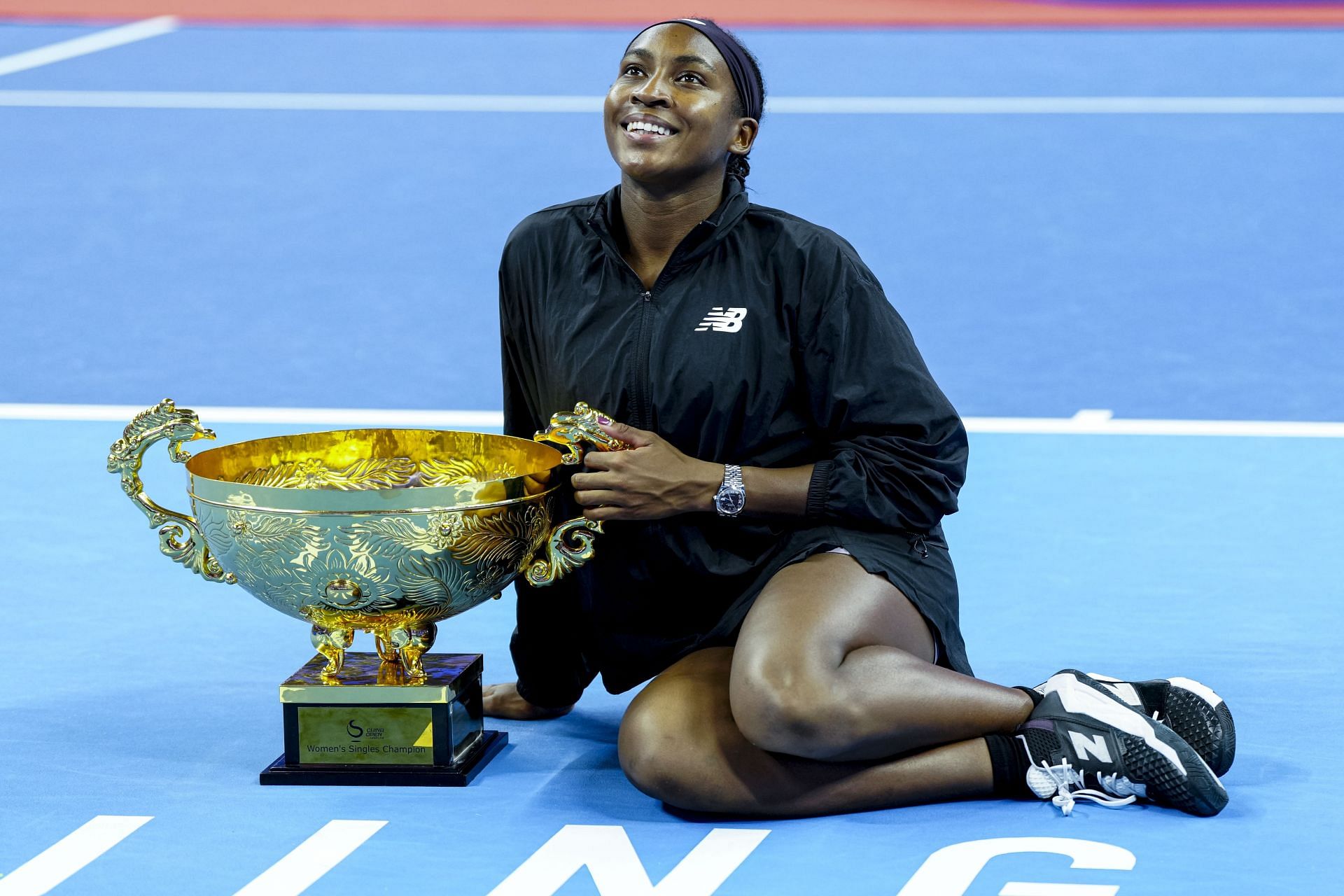 Gauff with the China Open trophy after victory in the finals of the tournament (Image via Getty Images)