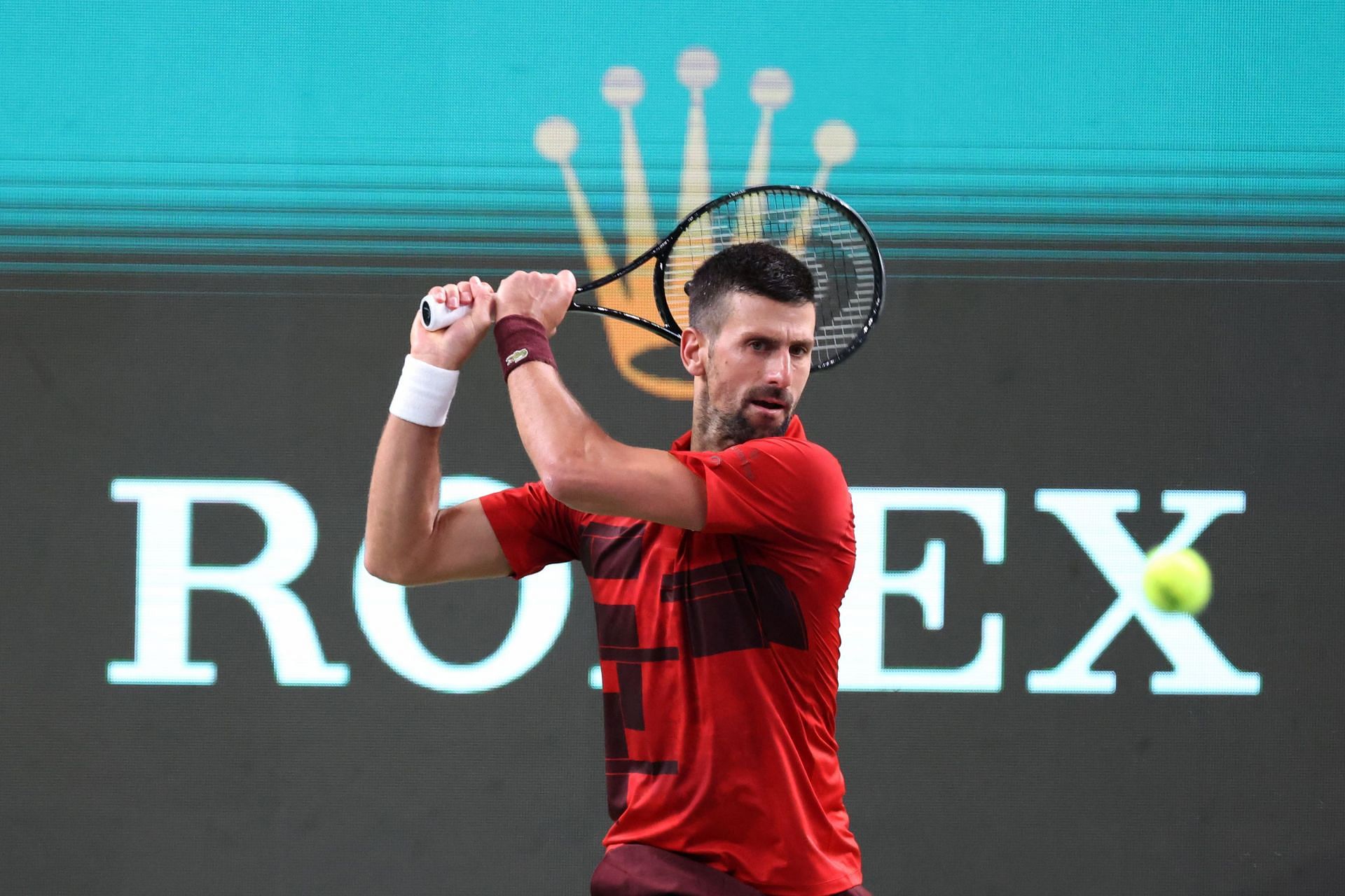 Djokovic plays a backhand in the 2024 Shanghai Rolex Masters - Day 9 - Source: Getty