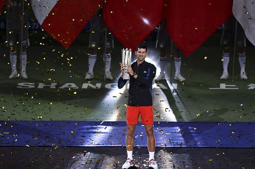 Novak Djokovic holds the trophy in the 2018 Rolex Shanghai Masters - Source: Getty