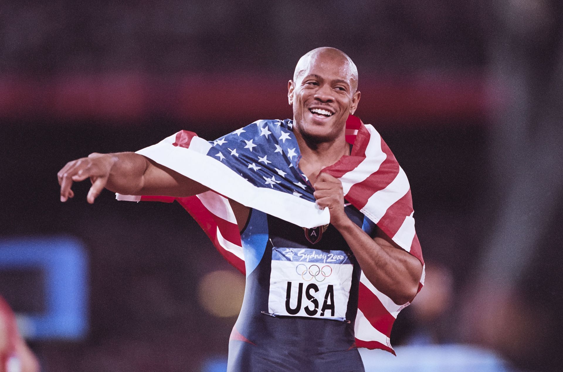 Greene after winning the 4x100m relay at the 2000 Sydney Olympics (Image via Getty Images)